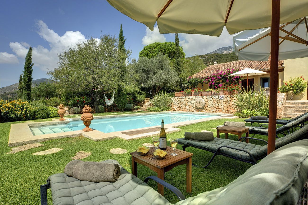Sun loungers and swimming pool 