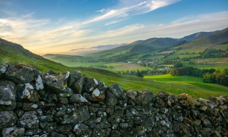 Landscape Of The Beautiful Rolling Scottish Borders Countryside At Sunset