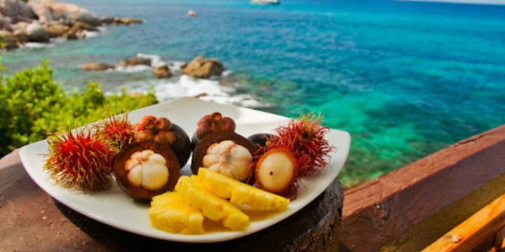 Black Pineapple in a bowl by the sea