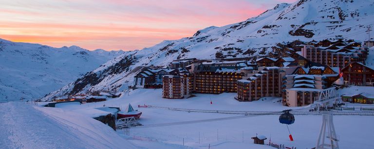 Sunset over the ski slopes and chalets, St Martin de Belleville
