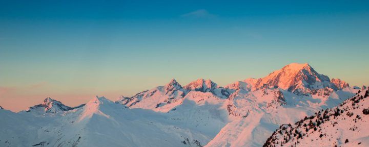 Snowy mountains at sunrise