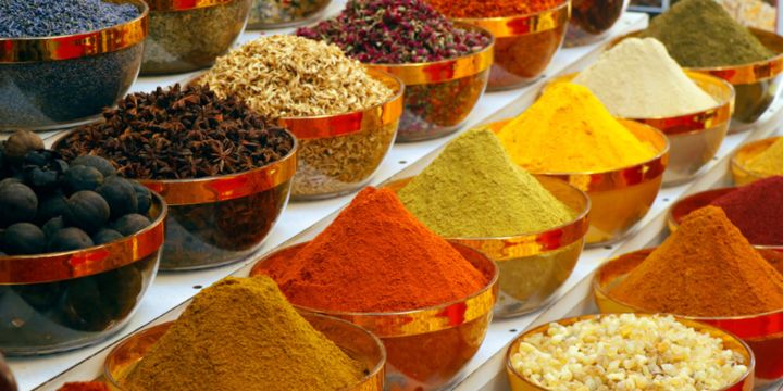 Spices Piled High At A Food Market