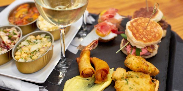 Platter of green wine and cod, Portugal