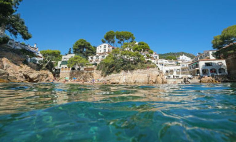 View of villas on the coast, Fornells