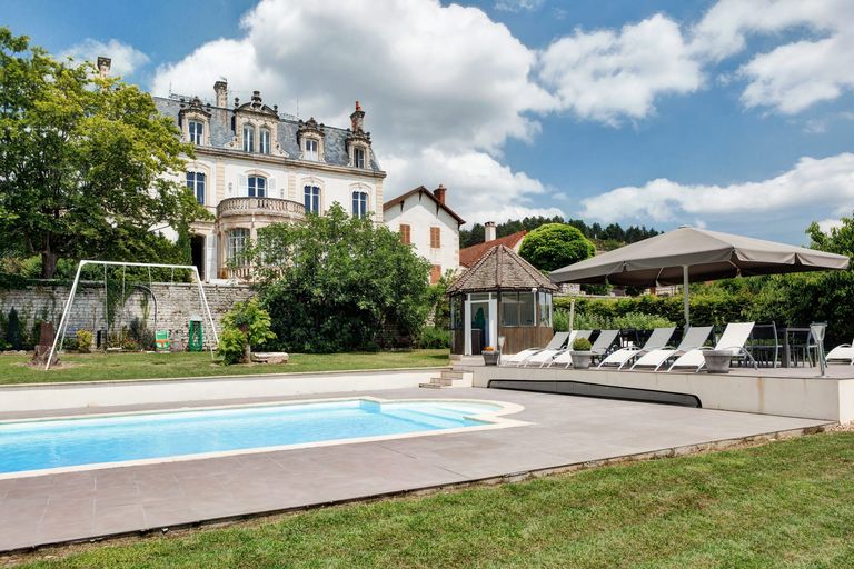 Chateau in France with pool and sunloungers