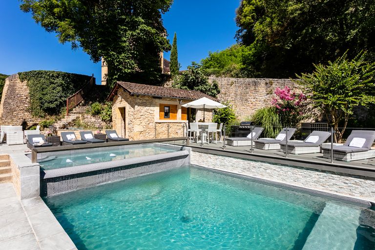 Chateau pool with sun loungers