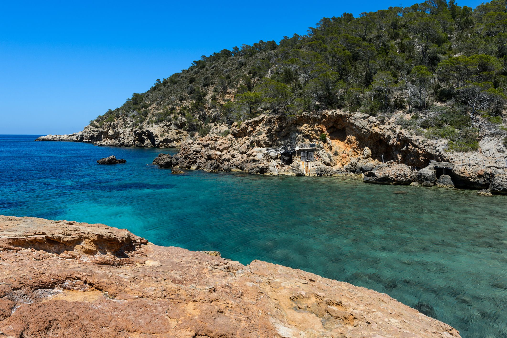 Cala Xuclar is one of the beaches on the island of Ibiza considered as virgin. With little flow and little sand, it is an authentic natural setting on the north coast.