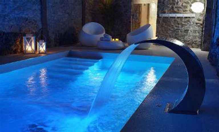 Pool with a water feature