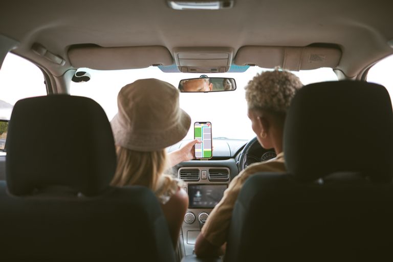 two people using navigation in a car