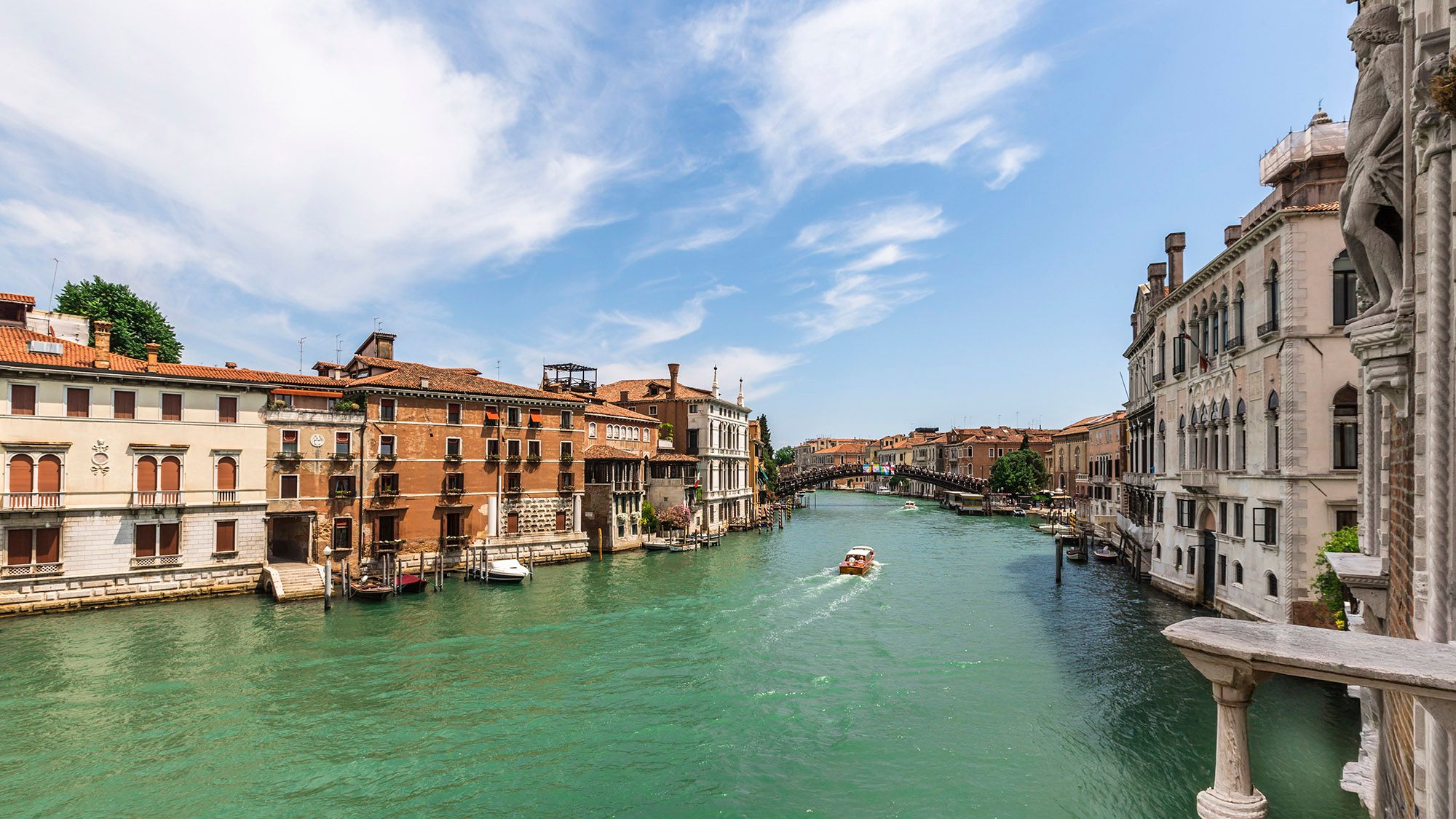 balcony view of canal and houses