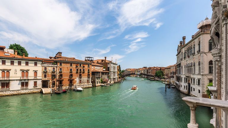 balcony view of canal and houses